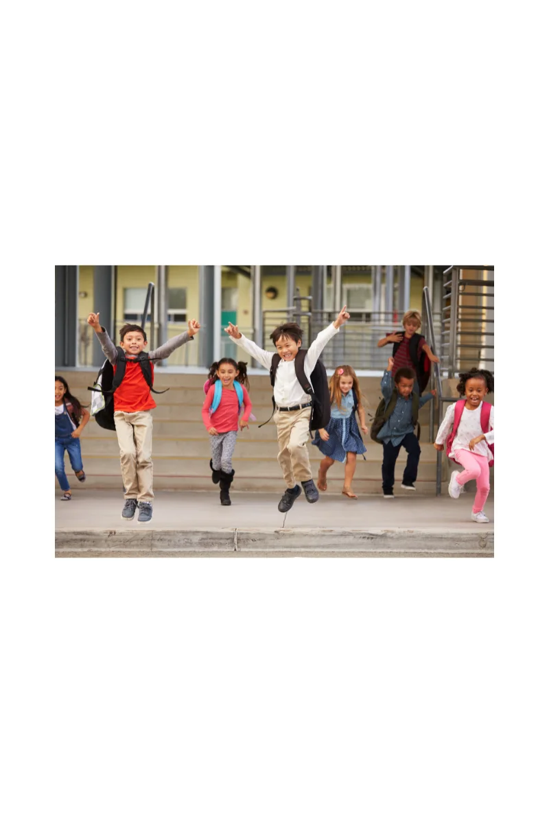 A group of kids jumping in the air