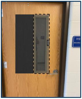 A door with a window and a screen.